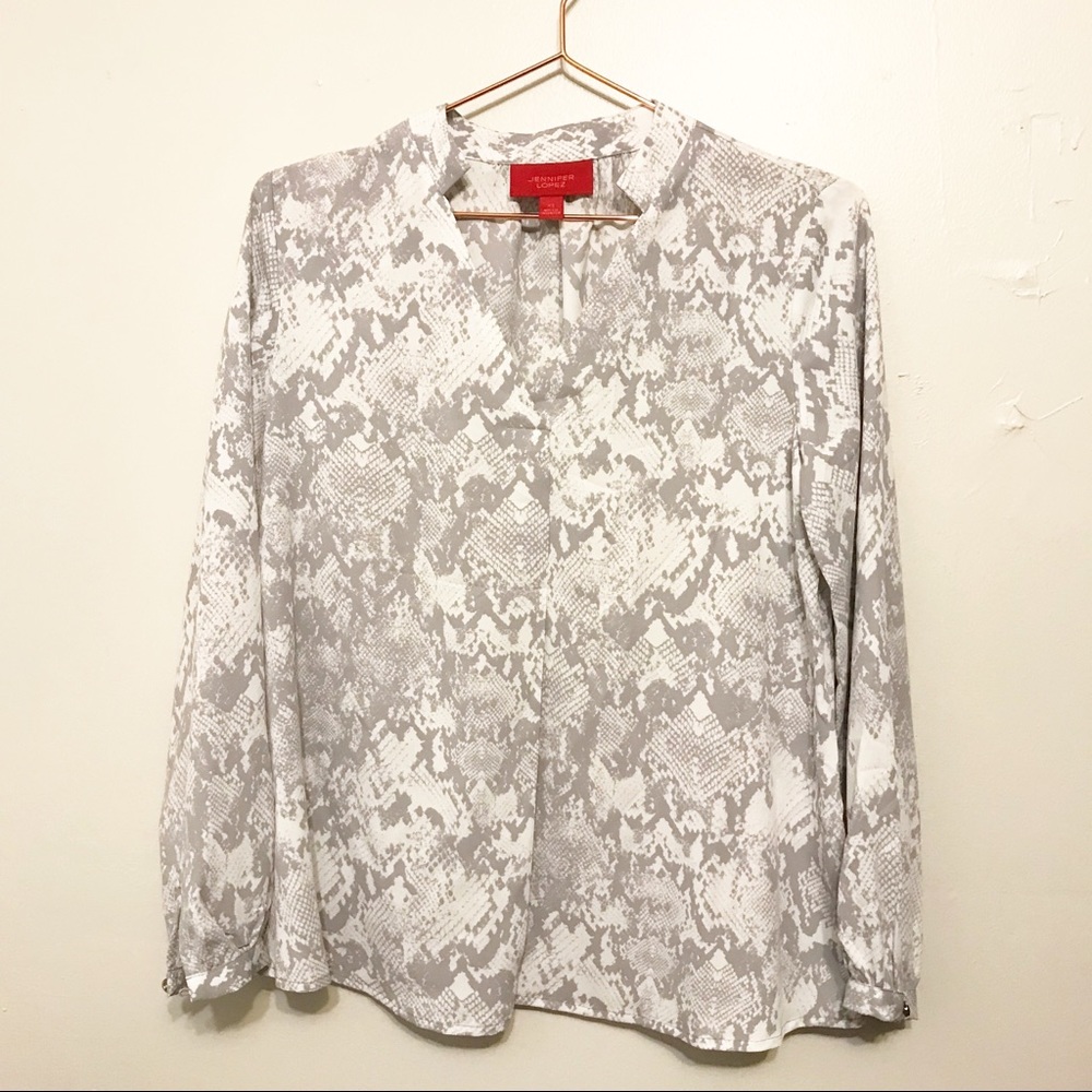 Jennifer Lopez Gray and White Blouse